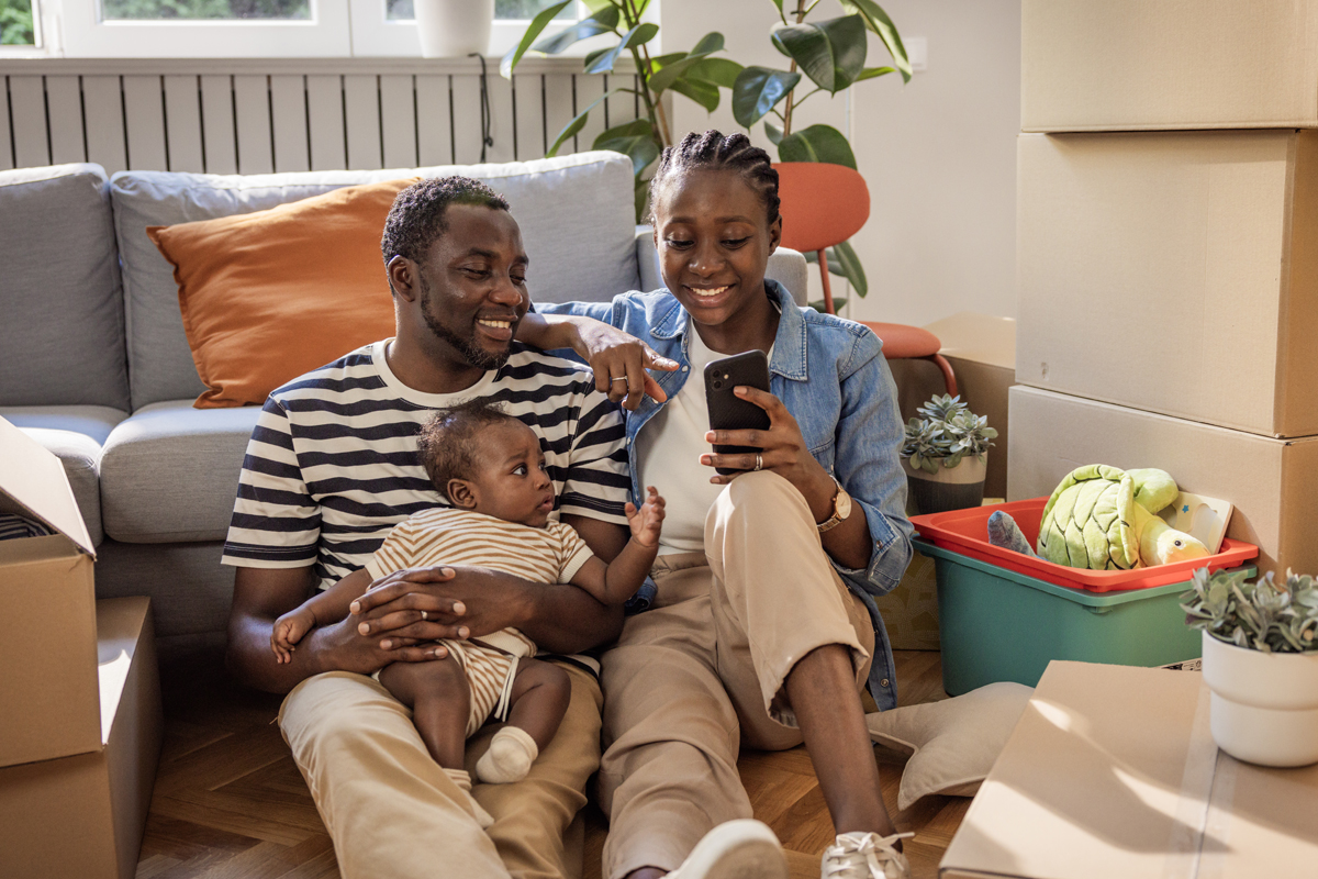 young family with baby new house