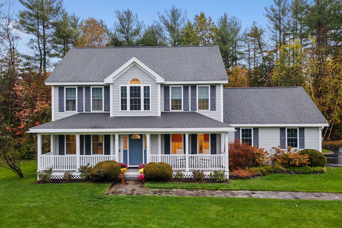 light gray house with blue and white trim