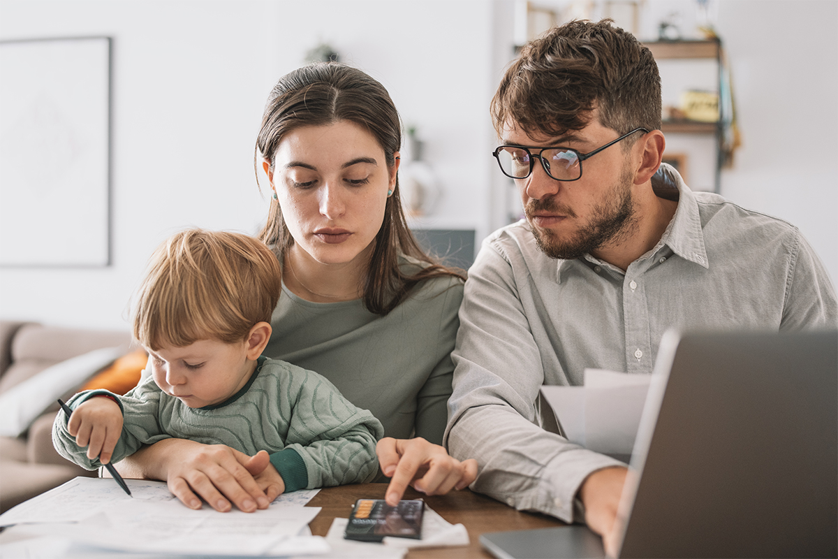 Family using a calculator
